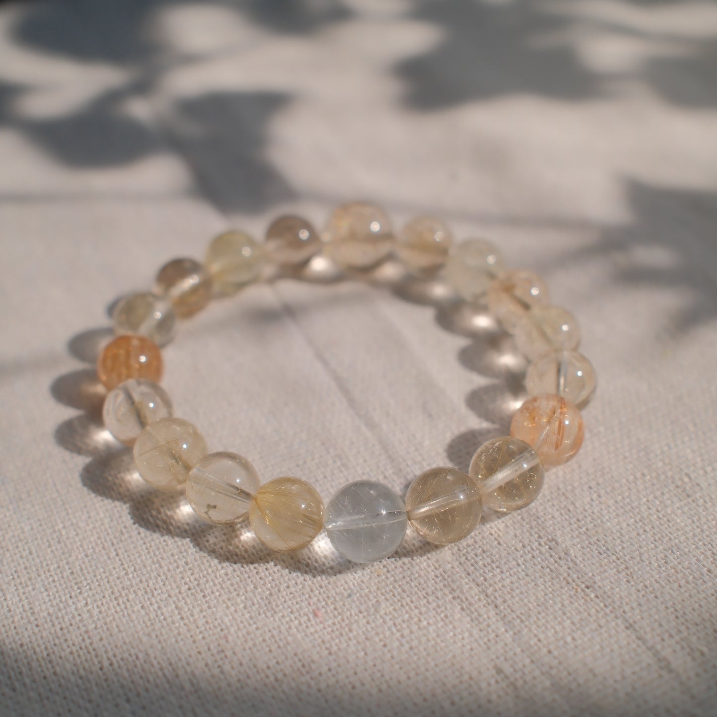 Starlit Threads –  High-clarity Rutilated Quartz Bracelet